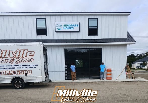 Millville Glass and Door team and service truck on a commercial installation